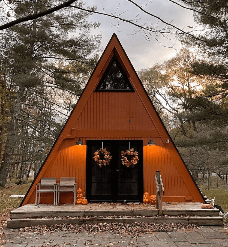 Front Elevation Design of this Small Orange A-frame cabin 